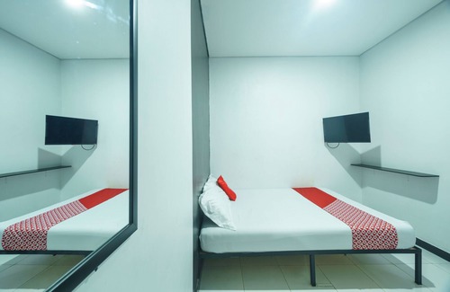 Duren Sawit Hotel | OYO 93133 Hotel Moraja Near Stikes Abdi Nusantara