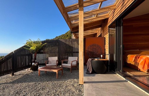Paparoa National Park Apartment | Pahautane Ridge - Elevated Sea Views Outdoor Stone Bath