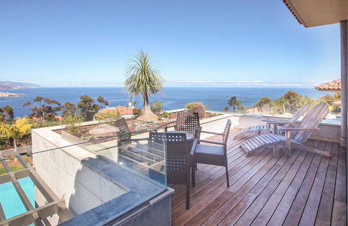 La Quinta House | Palm trees, mountains, sea ? Your view from the balcony and garden of this vacation home in Tenerife