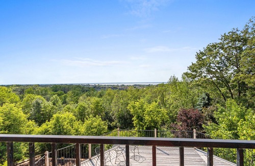 Green Bay House | Panoramic Bay Views: Spacious with Expansive Deck by RedAwning