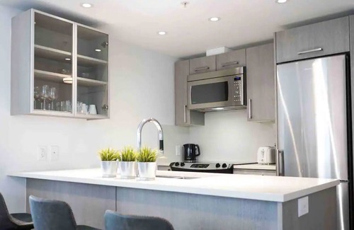 Downtown Eastside Condo | Panoramic views from modern condo +office