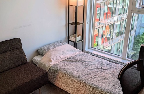 Downtown Eastside Condo | Panoramic views from modern condo +office