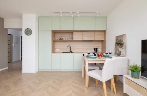 Zywiec Apartment | Pastel Apartment with Balcony and Parking by Noclegi Renters