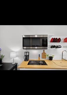 Midway Apartment | Peaceful Lakefront Getaway with Hot Tub & Fire Pit