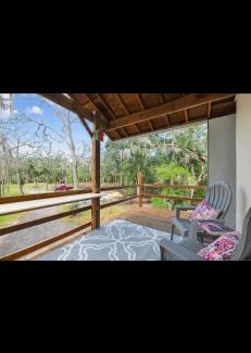 Midway Apartment | Peaceful Lakefront Getaway with Hot Tub & Fire Pit
