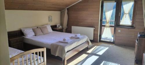 Sugag House | Pensiunea Colț din Rai