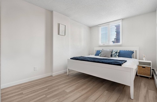 Eau Claire Condo | Perfectly Located, Peaceful Downtown Condo Steps to the Bow River
