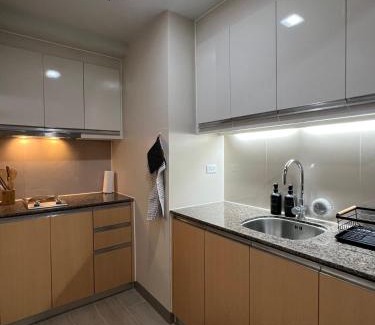 Bagumbayan Apartment | Pod To Go - Eastwood City
