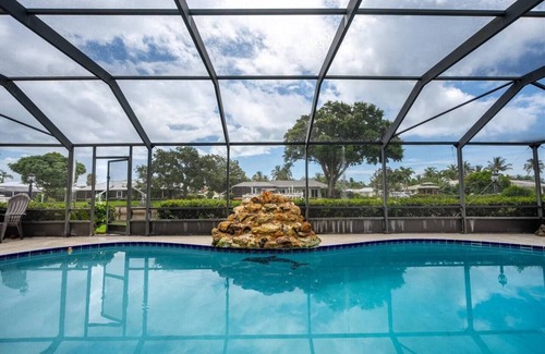 Florida Ridge House | Pool House on a Canal with Dock and Ocean Access