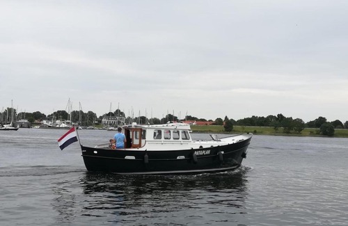 Kamperland Bed & Breakfast | Privé B&B Motorsailer Rataplan