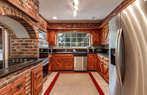 Orange Park House | Private Pool |1/2 Acre Wooded Lot |Feels Like an Authentic English Cottage |Fenced |Dogs Ok |3 Bikes