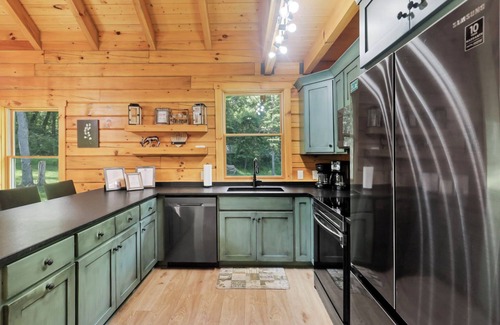 Logan Cabin | Private & Wooded Cabin with Eat-In Kitchen, Hot Tub, Fire Pit & Game Room