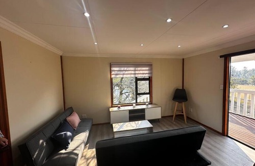 Lanseria Apartment | Quaint Log Cabin