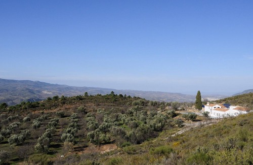 Lecrin Bed & Breakfast | Queen size bed room in vegetarian B&B within Sierra Nevada Natural Park