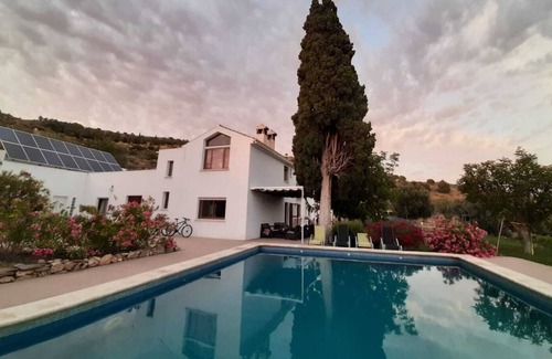 Lecrin Bed & Breakfast | Queen size bed room in vegetarian B&B within Sierra Nevada Natural Park