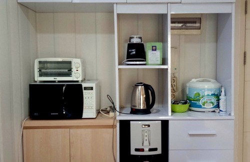 Cikarang Apartment | Quiet and Peaceful stay facing directly to the lake with sunset view