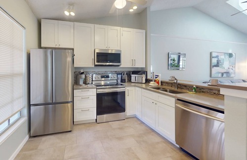 Capri Isle Condo | Quiet and Private Complex Off the Main Strip. Easy Stroll to Beach, Shopping, Activities. Pool.