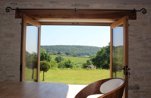 Brimpsfield House | Quiet16th Century Cotswold Barn, refurbished. Panoramic views on organic farm