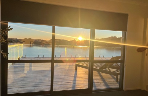 Raglan House | Rangitahi paradise. A modern 4 bedroom home overlooking the estuary in Raglan.