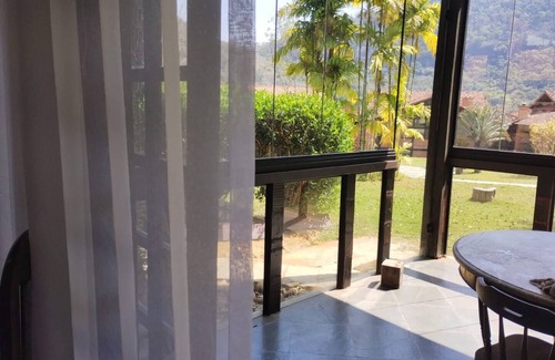 Araras Apartment | Refúgio Rústico em Condomínio Vilarejo das Cachoeiras