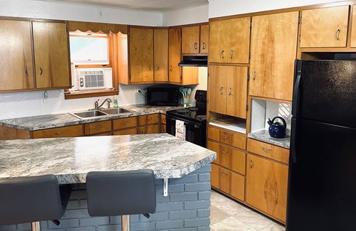 Manistee Apartment | Relax at Redberry House—just blocks from downtown and Lake MI beaches