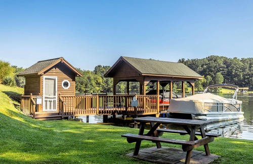 New River House | Relax at this serene waterfront retreat featuring a private dock, perfect for lake lovers!