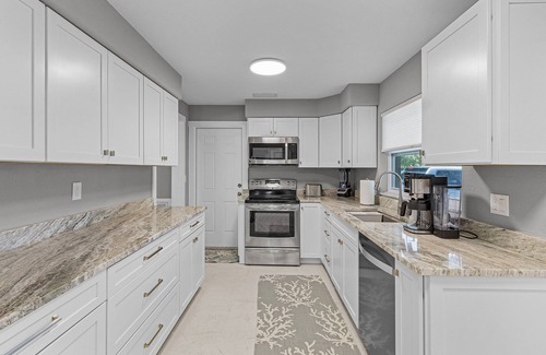 Eight Lakes House | Relax in Style: 3BR/2BA Retreat, Pool & Tiki Hut