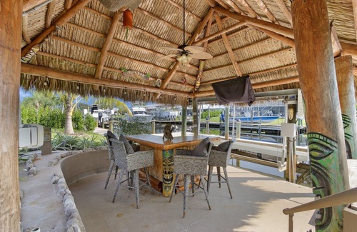 Eight Lakes House | Relax in Style: 3BR/2BA Retreat, Pool & Tiki Hut