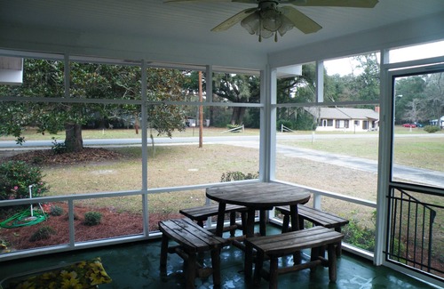 Woodbine House | Relax on the Screened Porch or Enjoy the Nearby Area Attractions