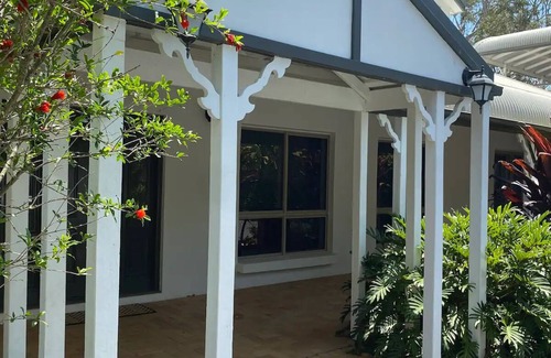 Carbrook House | Relax with your whole family at this serene resort-style retreat.
