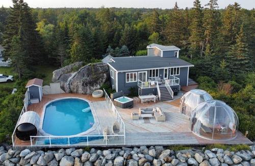 Hunts Point Cottage | Relaxing Oceanfront Retreat . Hot tub -sauna-pool-clear domes-private