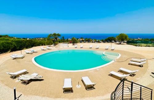 Trinita d'Agultu e Vignola Apartment | Residence with swimming-pool in Isola Rossa, just about 2 km from the beach La Marinedda
