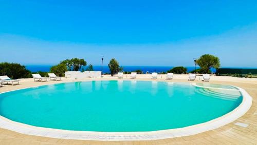 Trinita d'Agultu e Vignola Apartment | Residence with swimming-pool in Isola Rossa, just about 2 km from the beach La Marinedda