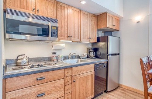 Century West Condo | Resort living, 2 Bedroom Condo with Balcony Views, Community Pool & Hot Tub!