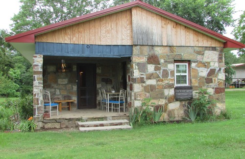 Talihina House | Restored rock house with hot tub and beautiful private deck.