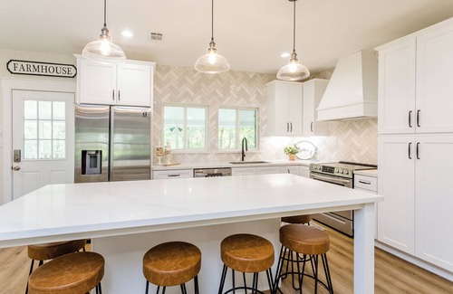 Coldspring Other | Retreat to the country. Three updated farmhouses, 28 acres, pickleball court.