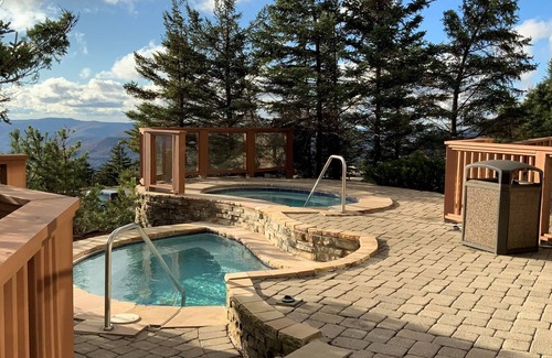 Snowshoe Apartment | Rimfire #210B - Close to it all - the Slopes, the Village, even Restaurants and Shops - plus Heated Underground Parking! by RedAwning