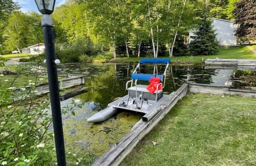 Newaygo House | Riverfront Blissful Cottage