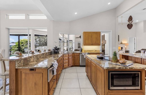 Pelican House | Riverfront Luxury with Heated Pool, Spa & Private Dock – Sunny Shores Escape