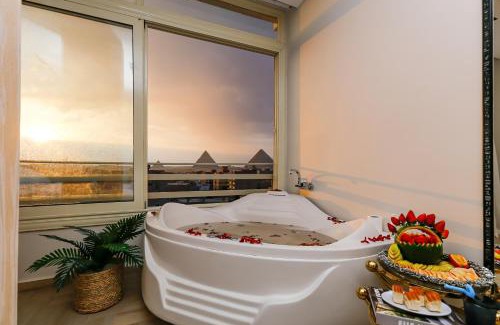 Al Haram Apartment | Rixoss Tower Pyramids View
