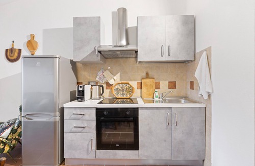 Scano di Montiferro Apartment | Room 'Euterpe' with shared terrace, Wi-Fi and air conditioning