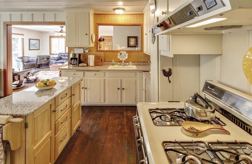 Guerneville Cabin | Roskamp ~ Riverfront Cabin with Large Yard, Seasonal River Dock & Boats