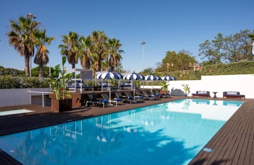 Belem Hotel | Royal-Inspired Stay with Indoor & Outdoor Pools | Free Parking and Pet-Friendly