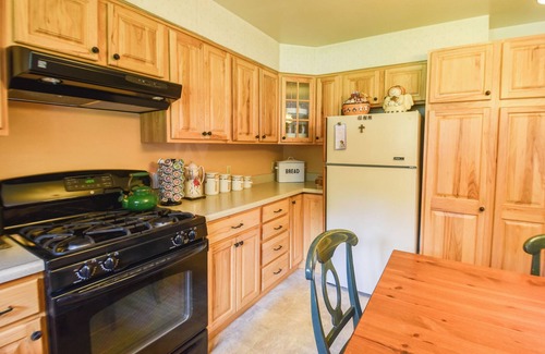 East Leroy House | Rustic Hills Retreat.a scenic home on beautiful lake front property.