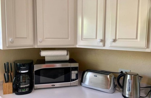 West Bay Apartment | S2A Blue Pavilion - Beach Transfers Meals Tours Island Retro Chic