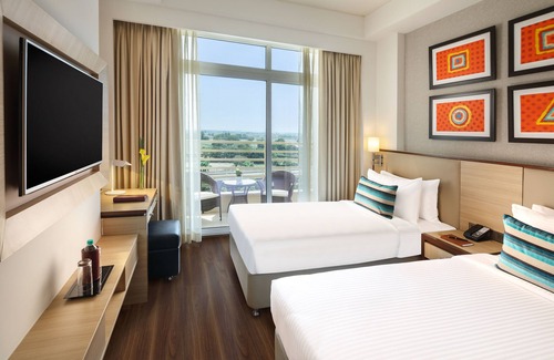 Noida Hotel | Sandal Suites Op. by Lemon Tree Hotels