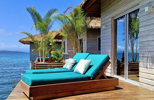 Isla Solarte House | Seaside Dream Over Water Bungalow, Bedroom, King Bed, Living Room, Kitchenette