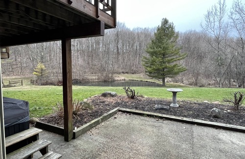Rodman Apartment | Secluded Apartment Overlooking Ponds with Hot Tub, Fireplace and Game Room!