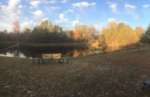 Sparta Cabin | Secluded family-friendly log cabin with swimming pond. Charm, comfort.