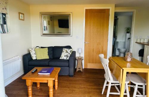 Pembridge House | Secluded Log Cabin in beautiful private gardens